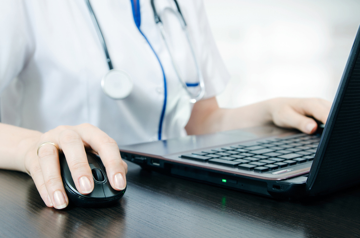 Doctor working with laptop in the office